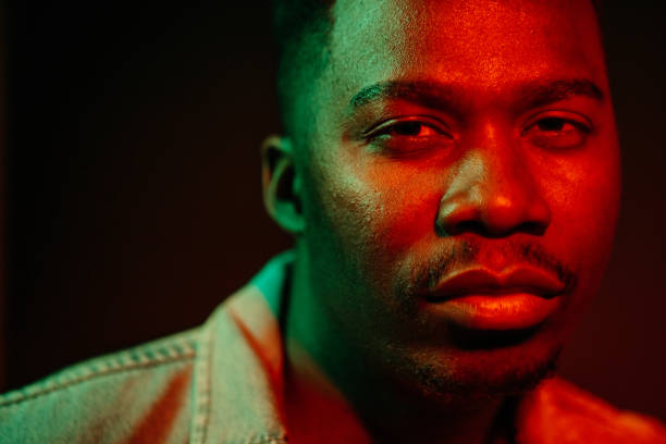 istock Serious Confident Man In Neon Light 1314415447