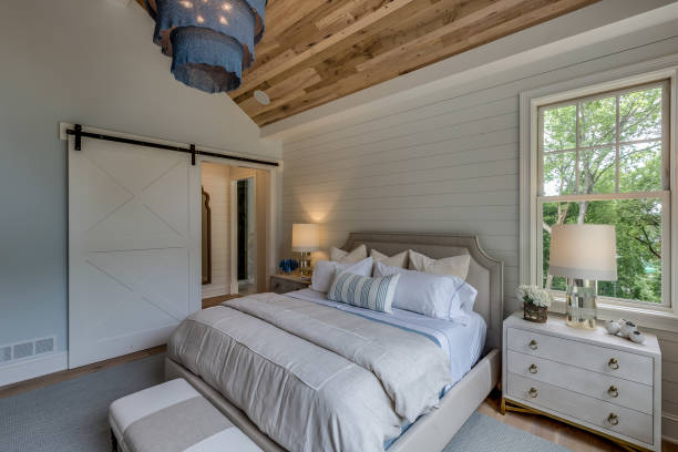 Wood cathedral style ceiling in bedroom