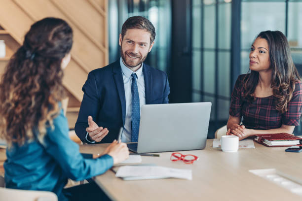 istock Executive director during a business meeting 1314417110