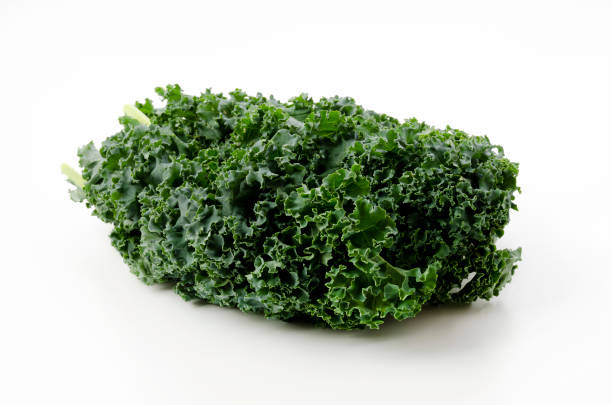 istock Fresh Curly green kale on white background 1314419866
