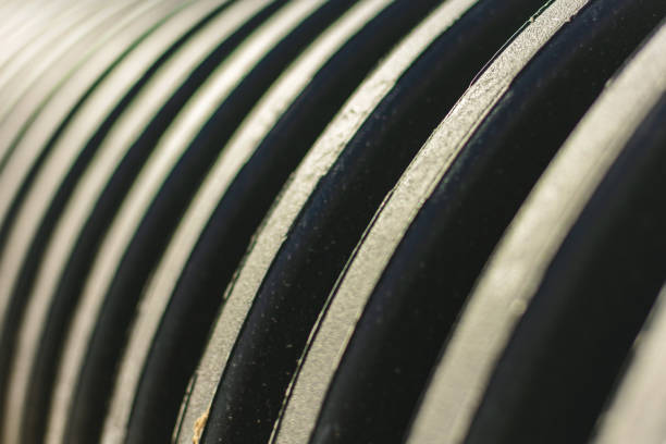istock Geometric and Curved Patterns Utility Drain System Tubing Background Photo Series 1314419995