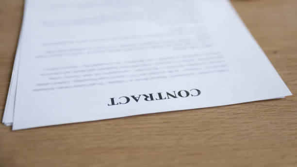 istock Close up of paper contract on office table 1314422873