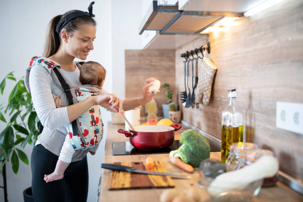 istock Multi-tasking mother in the kitchen. 1314422960