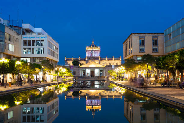 Guadalajara, Jalisco, Mexico - January 23, 2020: Historic Hospicio Cabanas in Guadalajara, Jalisco, Mexico at night with reflection.