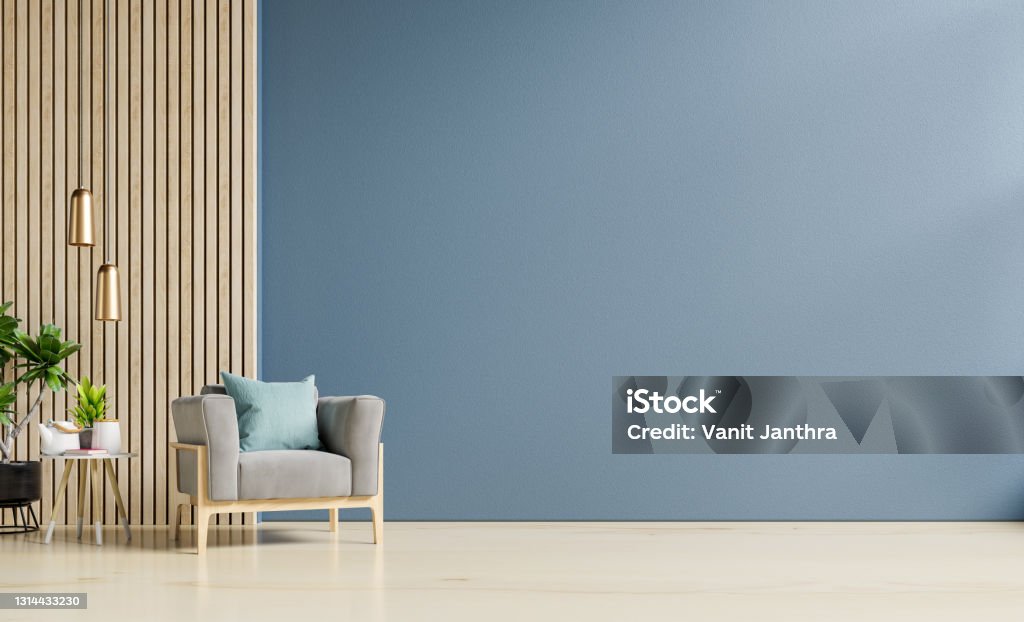 Stylish Modern wooden living room has an armchair on empty dark blue wall background. Stylish Modern wooden living room has an armchair on empty dark blue wall background,3D rendering Wall - Building Feature Stock Photo