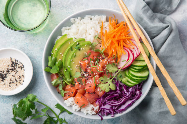 istock salmon poke bowl (avocado, salmon, carrot, cucumber, red cabbage, radish and rice) 1314433983