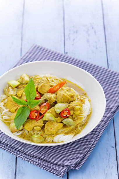 istock Rice noodles with chicken green curry Thai cuisine 1314437215