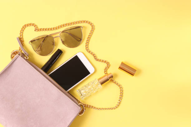istock women's bag and cosmetics on a colored background 1314438114