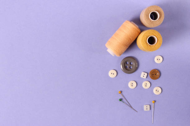 istock sewing accessories close-up. hobbies, fabrics and threads for sewing 1314438237
