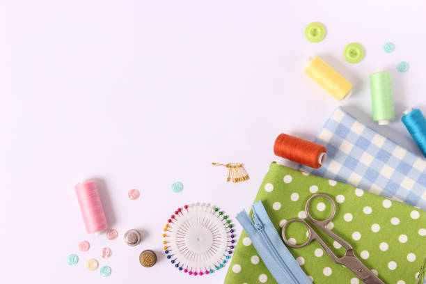 istock sewing accessories close-up. hobbies, fabrics and threads for sewing 1314440596