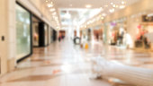 Abstract blur modern shopping center. Mall high fashion on light defocus background.