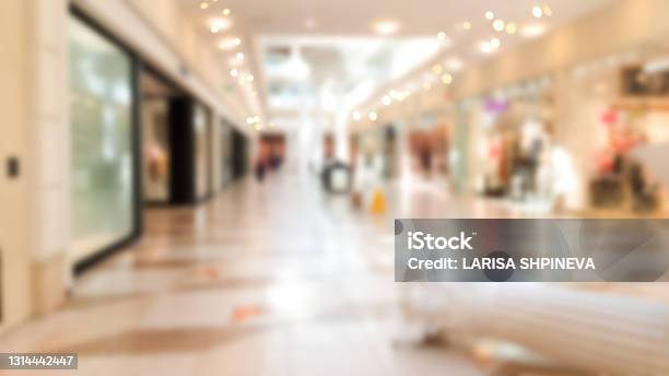Abstract Blur Modern Shopping Center Mall High Fashion On Light Defocus Background Stock Photo - Download Image Now