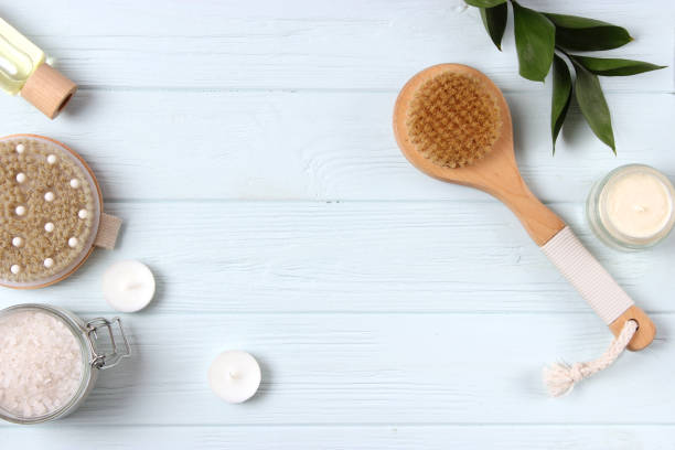 istock brush for dry massage on a colored background top view. 1314449276