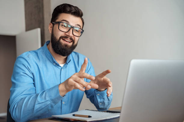 istock Man remote freelance worker having video conference meeting using laptop 1314449630