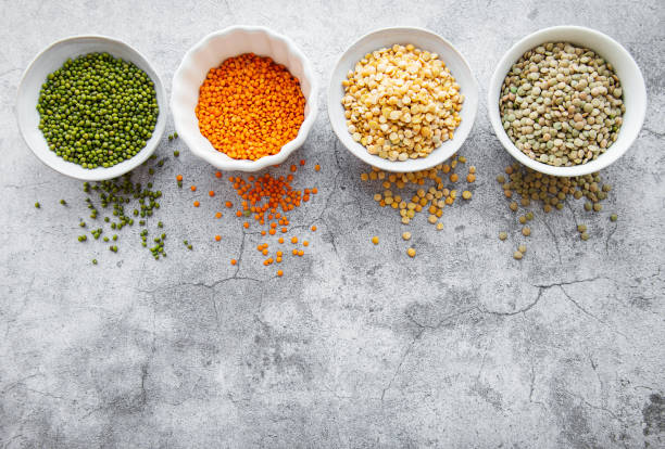 istock Bowls with different types of legumes 1314450517