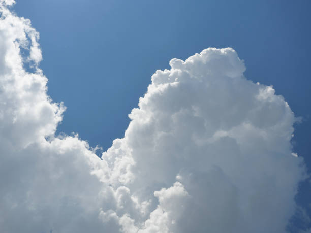 istock Cumulonimbus cloud formations on tropical sky 1314454450