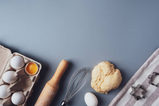 istock Flat Lay composition, ingredients for baking cookies on a gray background, copy space. Making cookies or cupcakes for Valentine's Day, Mother's Day, Father's Day. The concept of festive food 1314455163