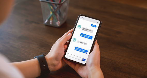 Digital chatbot and sent to recipient on mobile, hand using smartphone, Artificial intelligence, innovation and technology.