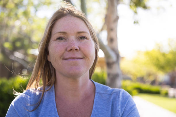 A woman outdoors at the park.