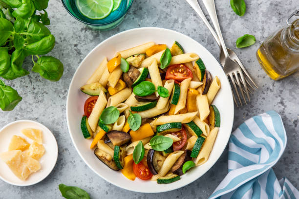 istock pasta with grilled vegetables ( zucchini, eggplant, bell pepper ant tomato) in white bowl 1314456600