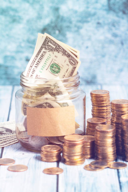 istock money in a glass bottle 1314459541