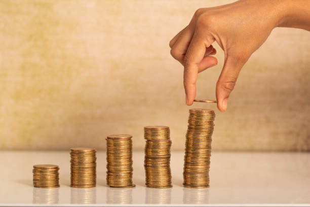 istock saving money of women hand 1314459648