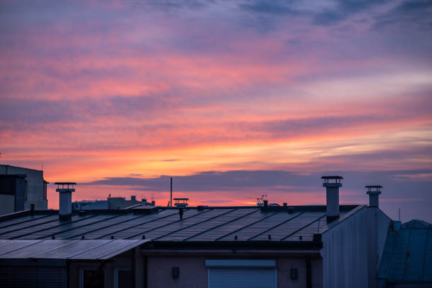 istock Scenic sunset above city roofs 1314459773