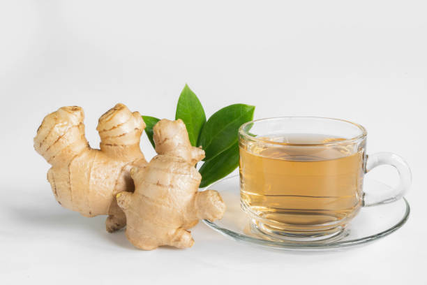 ginger hot tea cup and leaf on white background. - ginger tea cup cold and flu tea imagens e fotografias de stock