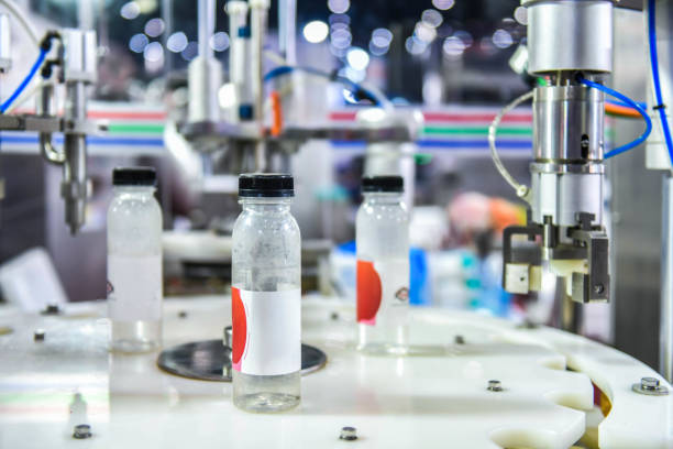 istock plastic Bottles transfer on Automated conveyor systems industrial automation for package 1314461006