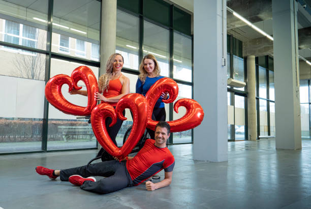istock personal trainers in gym, valentine theme 1314461031
