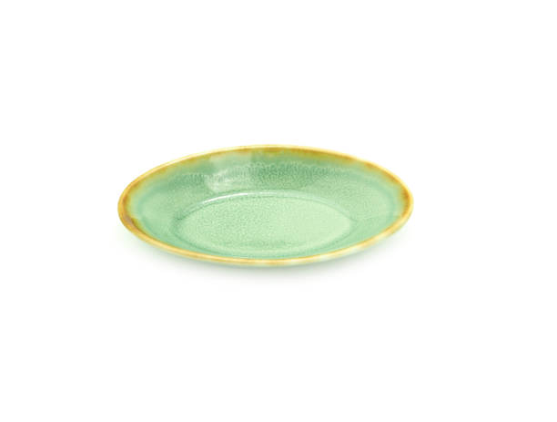 istock Oval ceramic plate turquoise japanese style isolated on a white background. 1314461974