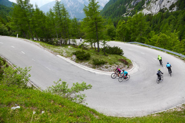 istock Group of cyclists on a hairpin curve 1314463755