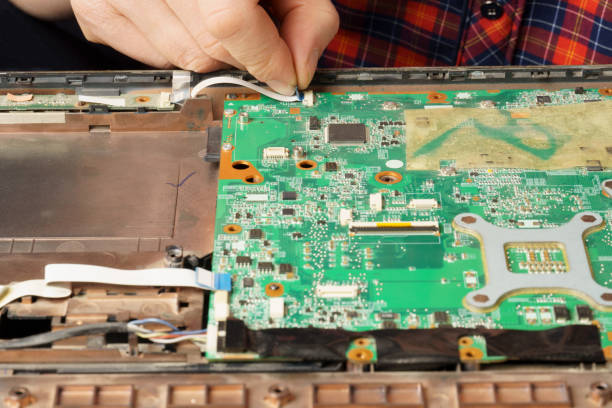 istock a computer repair technician disassembles a laptop for further cleaning or repair. service of personal computers 1314466853
