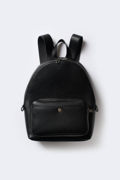 istock Black leather backpack, minimal casual sfashion style on white background 1314468044