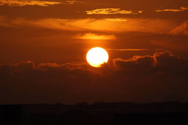 istock Sun rises as hot ball of fire 1314468083