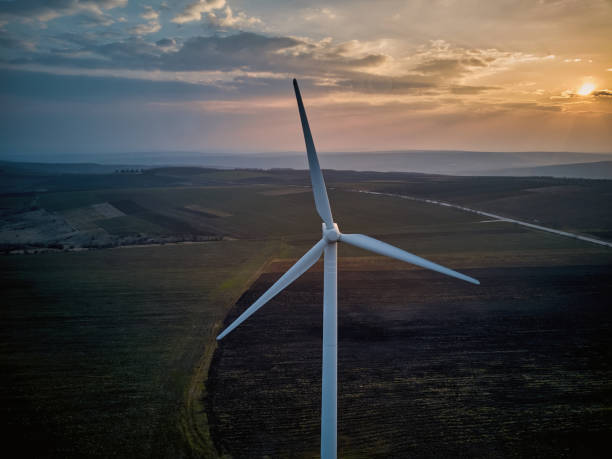 istock Aerial view of wind turbine at sunset 1314468356