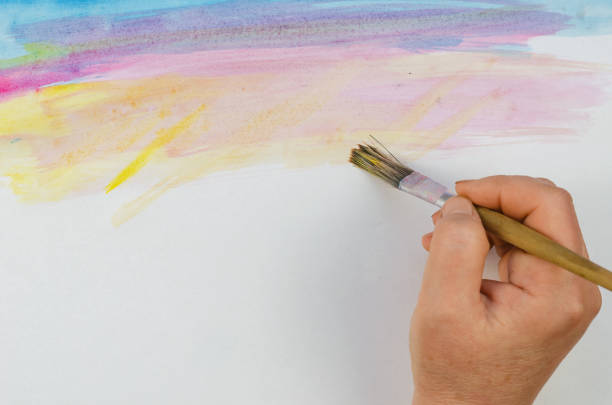 istock DIY, learning to draw, hobbies. Paint a picture on paper. Step 2: Picture the sunlight. 1314469440