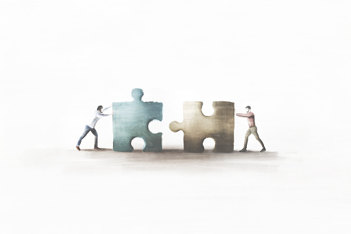 illustration of business men playing in teamwork with puzzle, cooperation concept