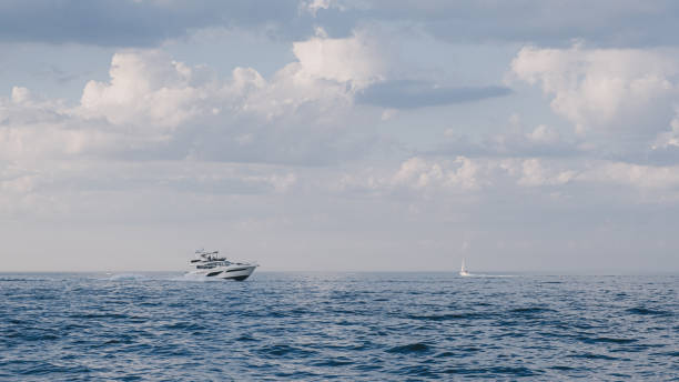 istock Yacht on the water under cloudy sky 1314470903