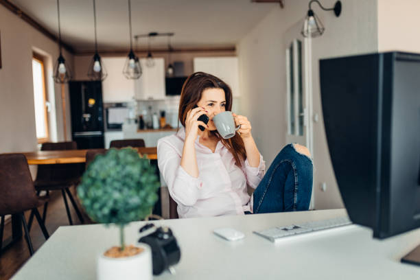 istock Happy brunette women working on a computer 1314470956