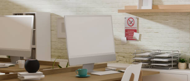 istock 3D rendering, co-working space with two computer devices, laptop and office supplies, in the room 1314472574