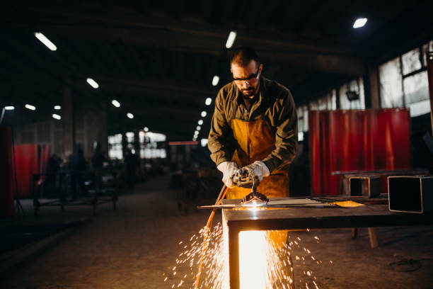 istock Welder working in a factory 1314473611