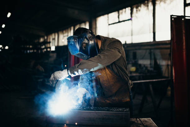 istock Welder working in a factory 1314473864