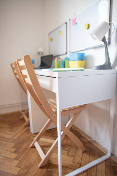 istock Desk with learning supplies at the kids room 1314474372