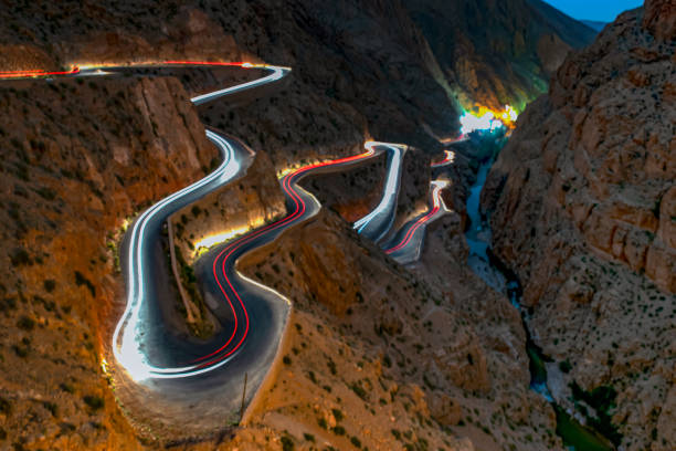 istock Dangerous curvy road at night 1314476668
