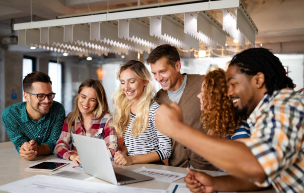 istock Happy creative team in office. Business, startup, design, people and teamwork concept 1314478810