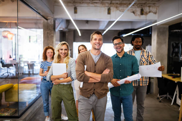 istock Happy creative team in office. Business, startup, design, people and teamwork concept 1314478930
