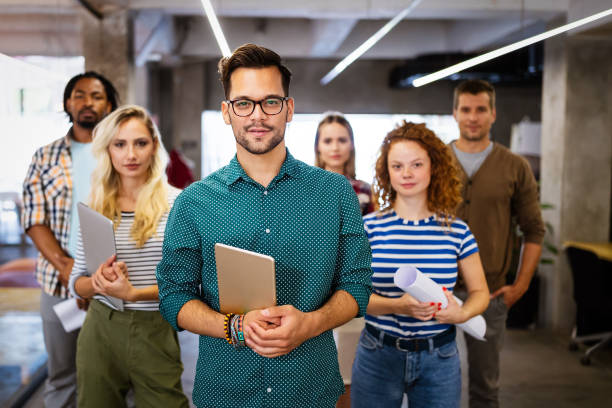 istock Group of business people and software developers working as a team in office 1314478936