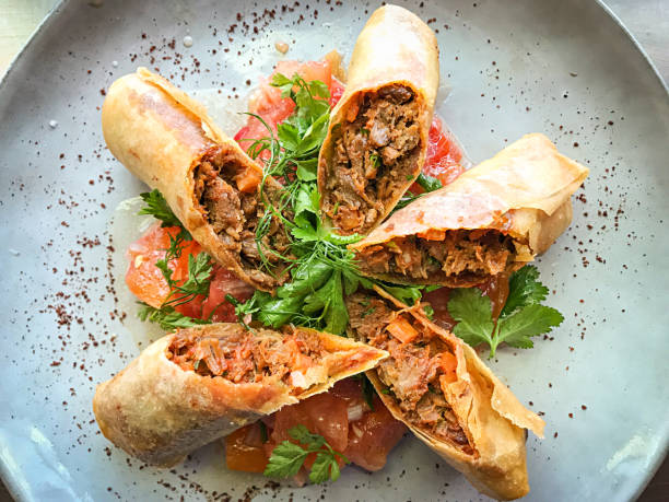 istock Oxtail Spring Rolls with herb salad and dip sauce 1314480831