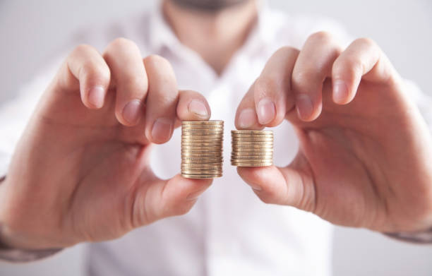 istock Man showing stack of coins. Business. Finance 1314481671